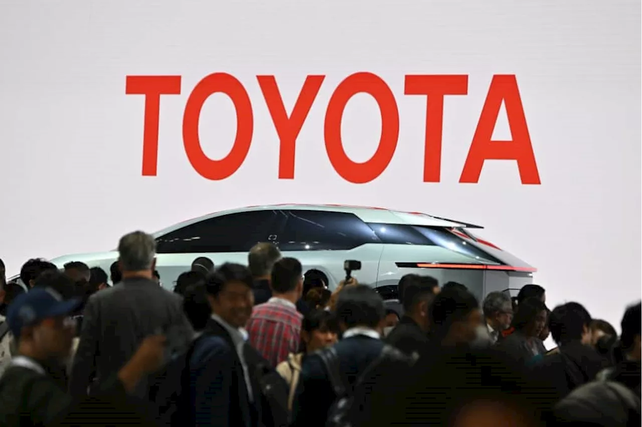 Toyota hikes annual forecast as first-half net profit doubles