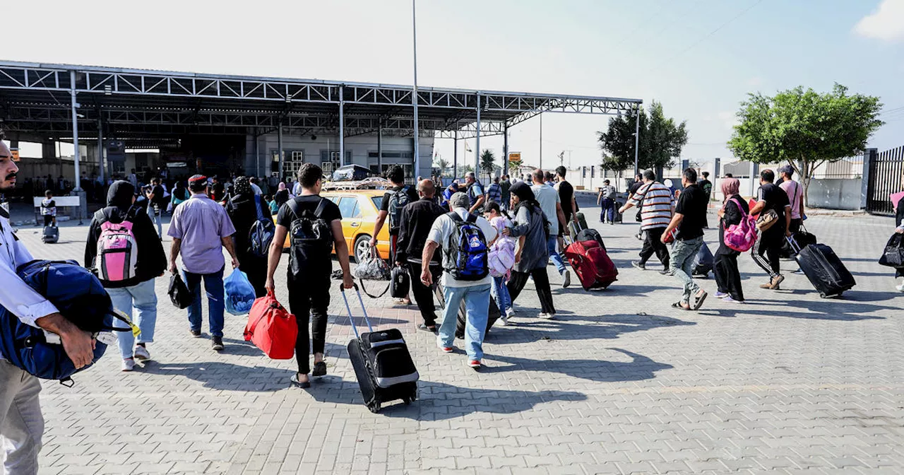 Americans among first foreigners to leave Gaza through Rafah border crossing into Egypt