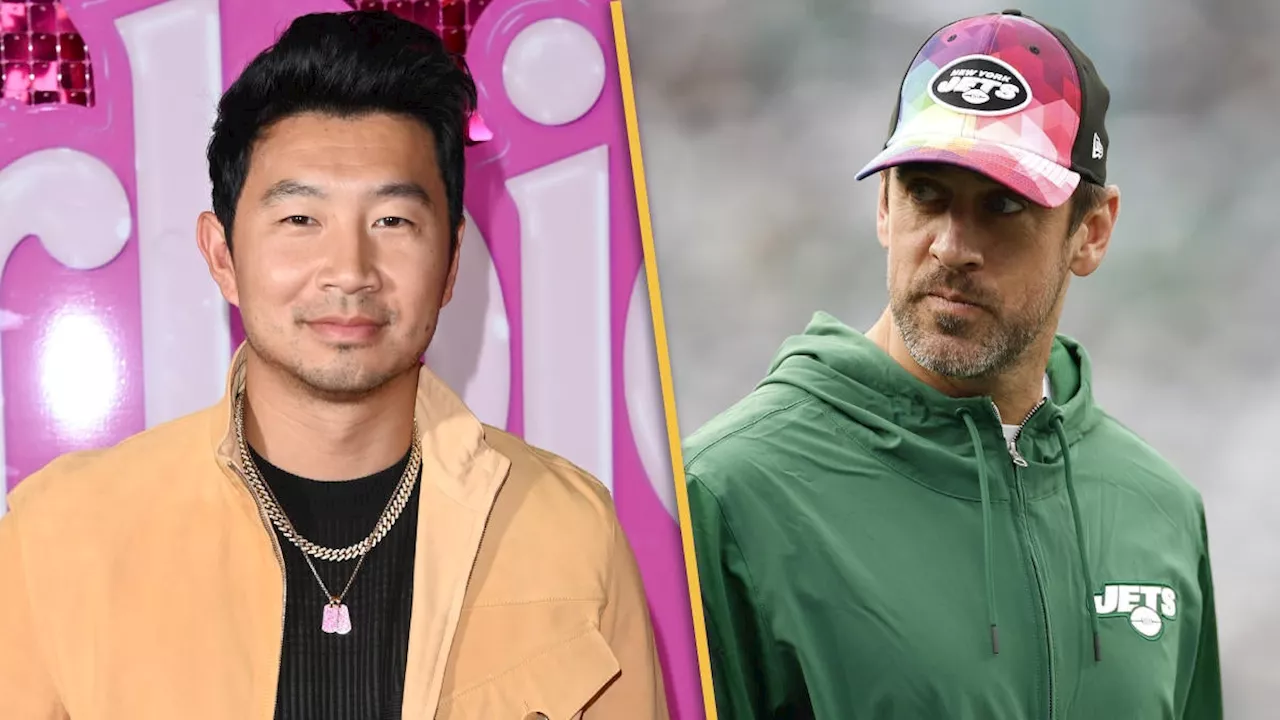 Simu Liu Dresses as Aaron Rodgers for Halloween After Tearing Achilles