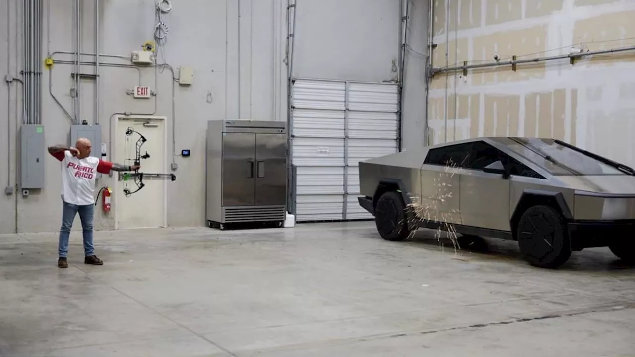 Watch Joe Rogan Try To Shoot An Arrow Into The Tesla Cybertruck's Body