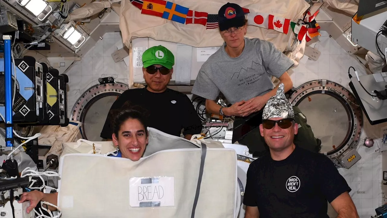 Astronauts in space dress up for Halloween ahead of spooky space walk