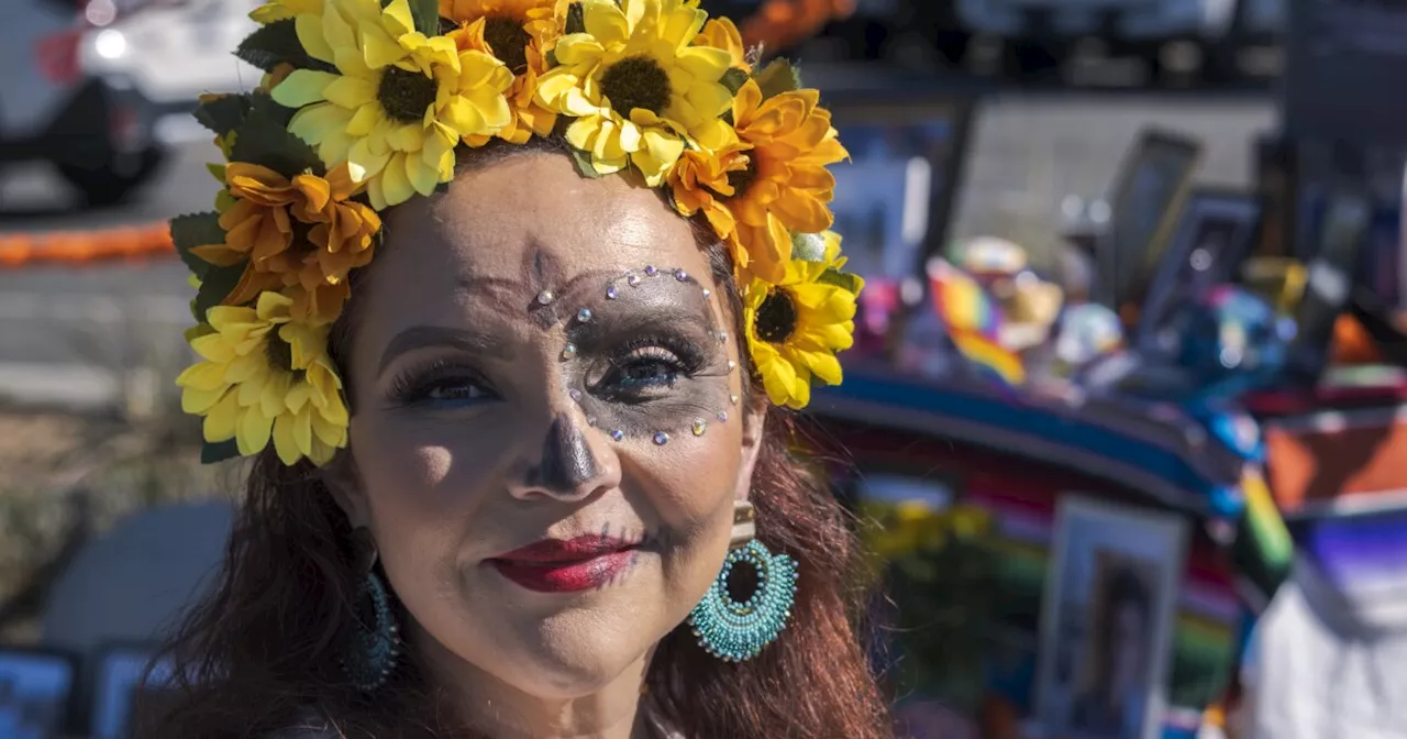 Volunteers stand guard over Hillcrest ofrenda