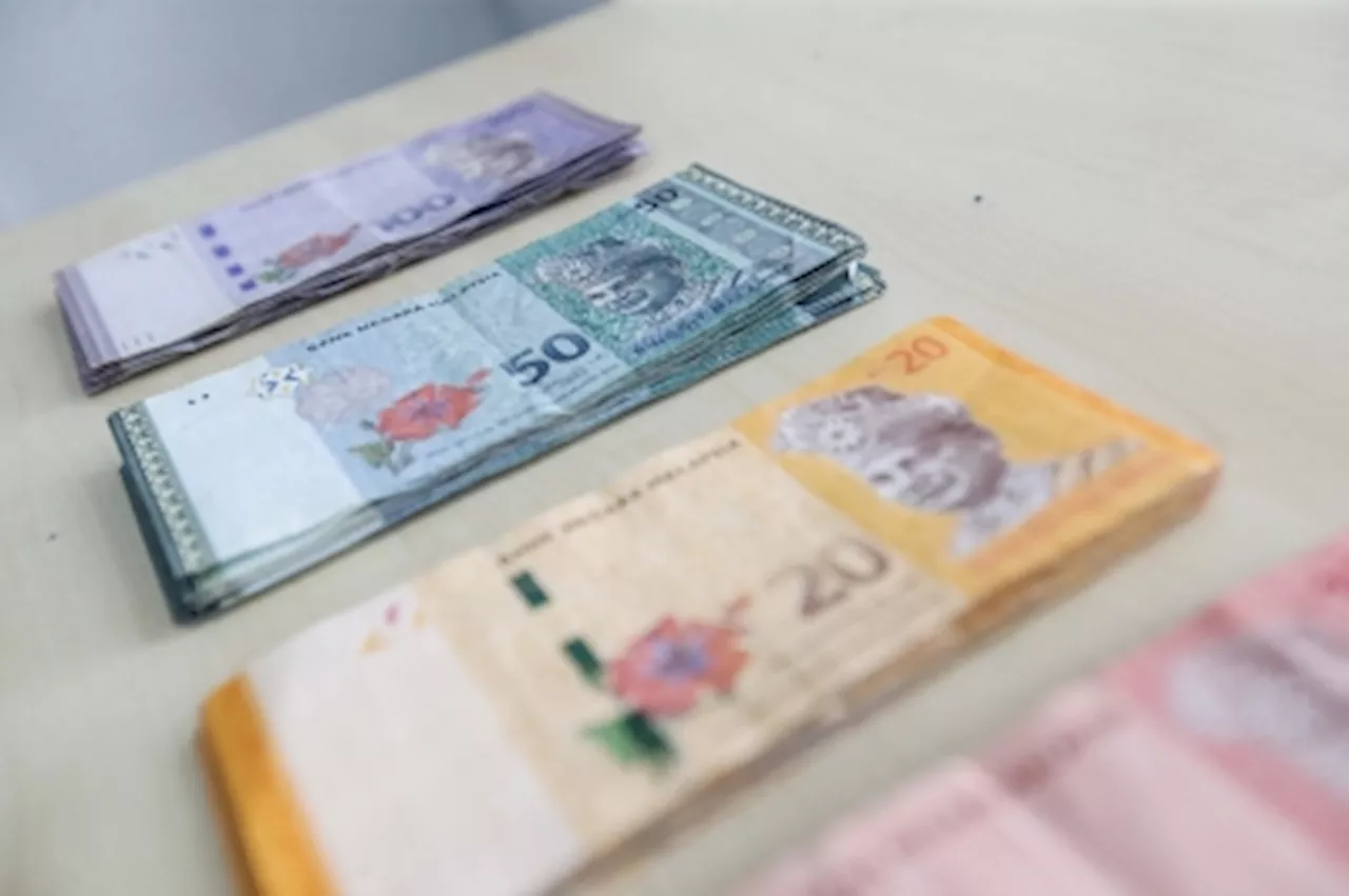 Ringgit ends lower ahead of fed decision on interest rates