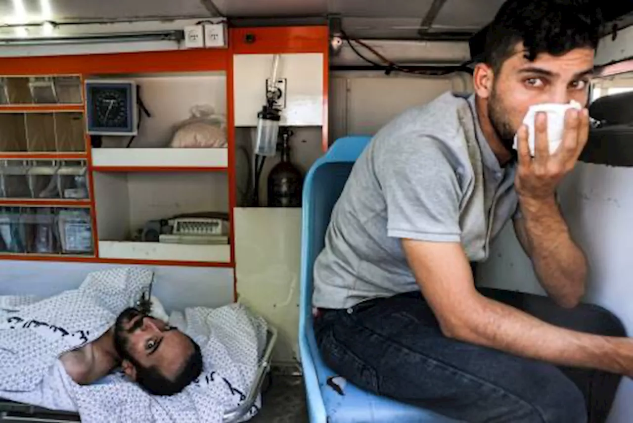 First wounded and foreigners escape war-torn Gaza for Egypt