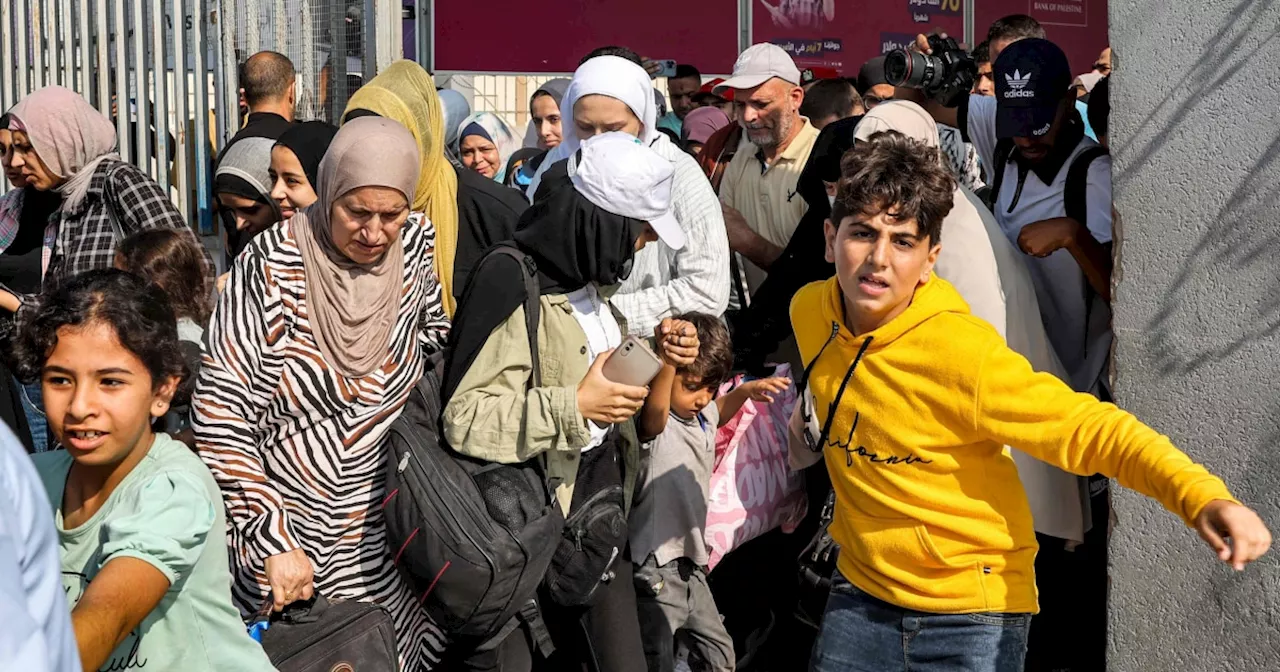 First civilians leave Gaza through Rafah border crossing to Egypt