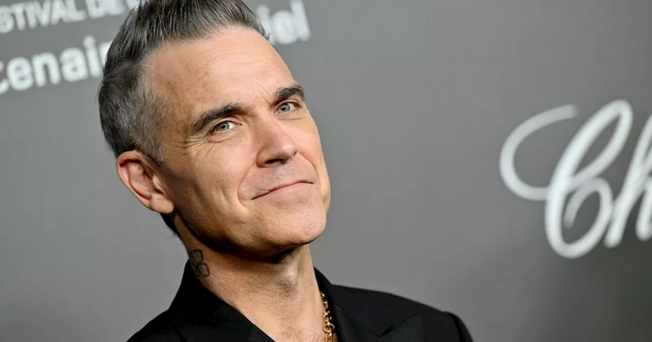 Robbie Williams to get Turkey Teeth after going through 'manopause'