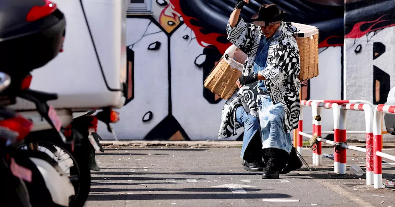 Samurai trash collectors clean Tokyo streets after Halloween revels