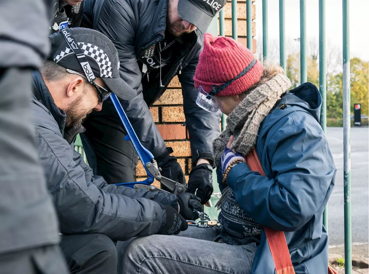 Protesters chain themselves to Telford International Centre entrance in opposition to arms fair