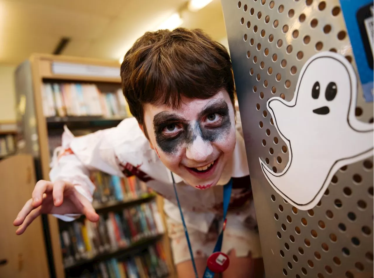 Spooky goings on at Market Drayton Library as children dress up for the Halloween party