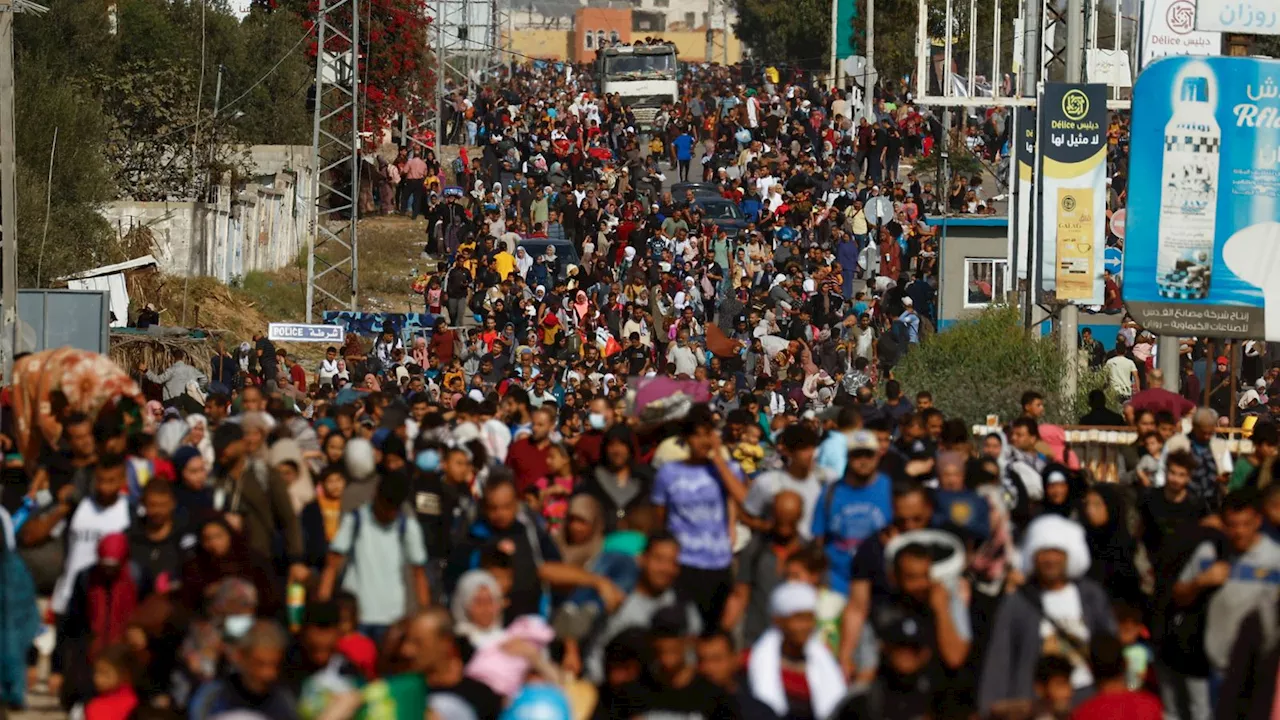 Palestinians stream onto Gaza highway as Israeli forces strike near hospitals