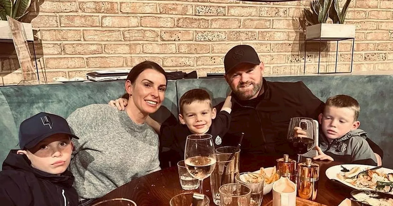 Coleen Rooney cosies up to husband Wayne after miscarriage heartbreak