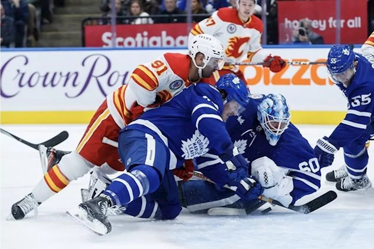 Domi scores shootout winner, Leafs survive blown 4-1 lead to down Flames 5-4