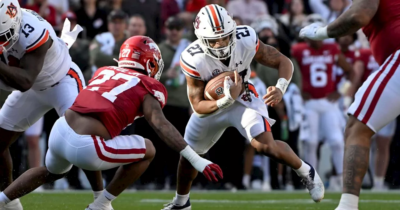 Auburn starts fast, routs Razorbacks to gain bowl eligibility