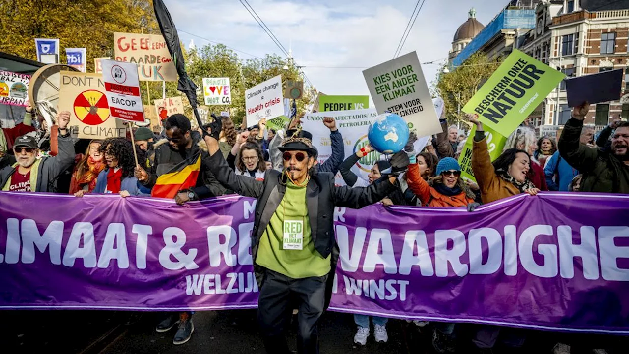 Klimaatdemonstratie in Amsterdam grootste ooit in Nederland, opstootje op podium