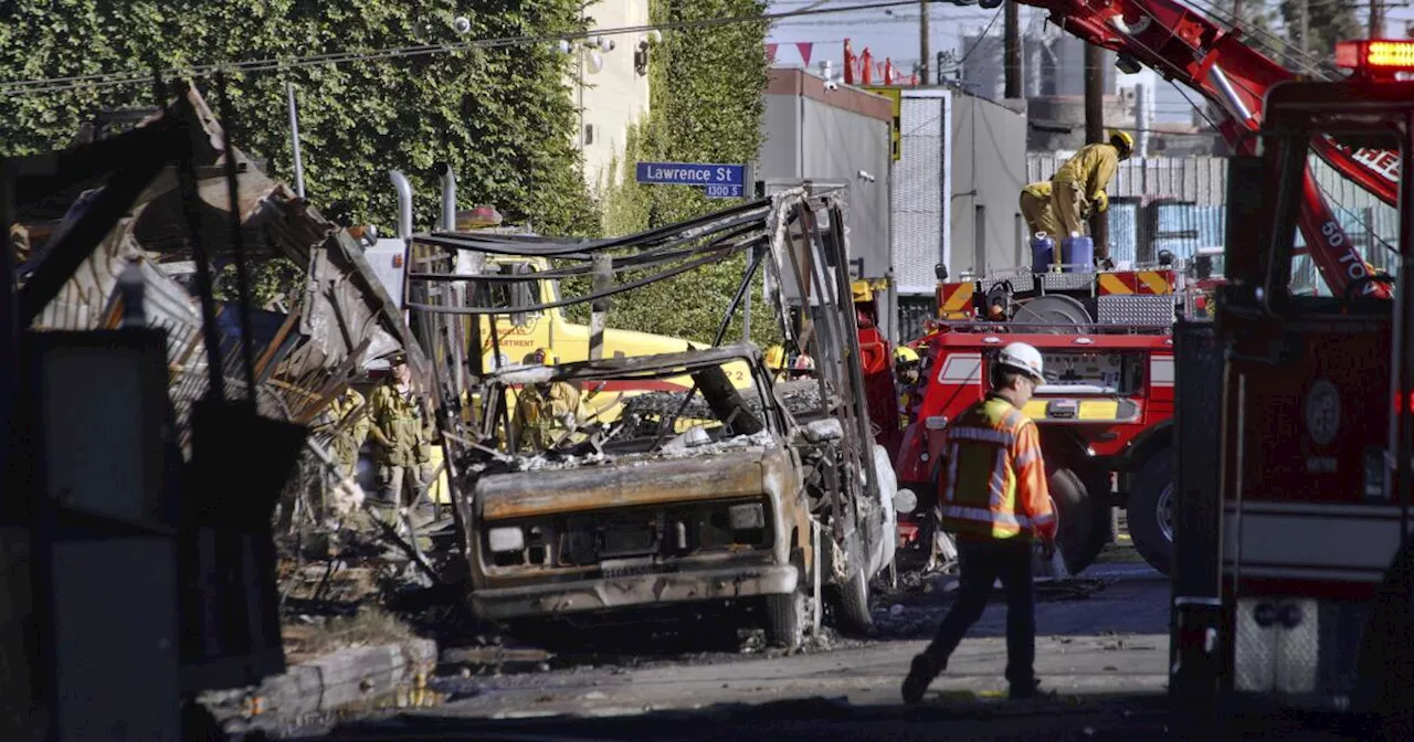 After massive fire closes Los Angeles interstate, motorists urged to take public transport