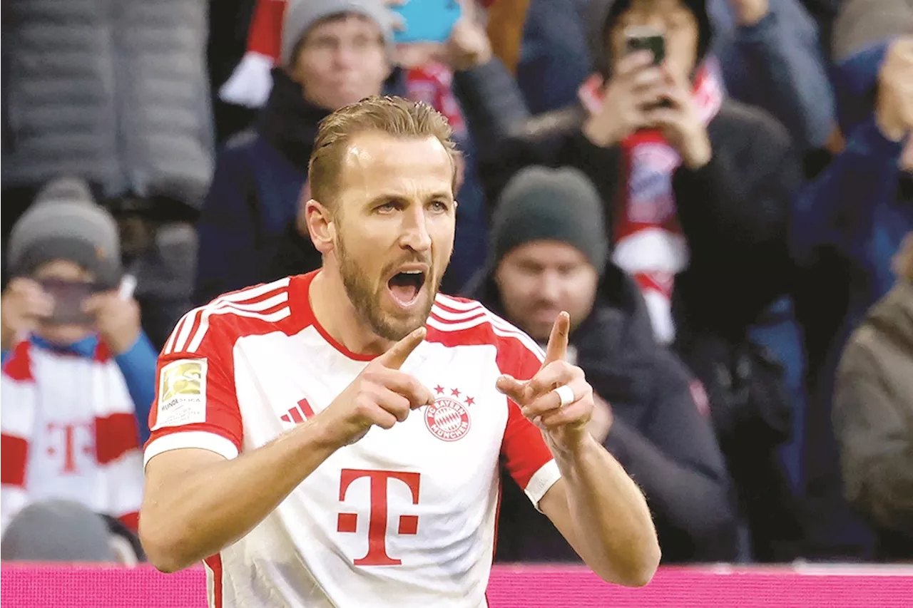 Kane scores brace to send Bayern top