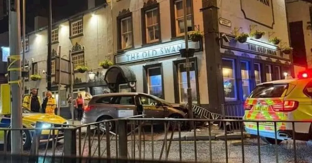 Uber crashes into railings outside pub