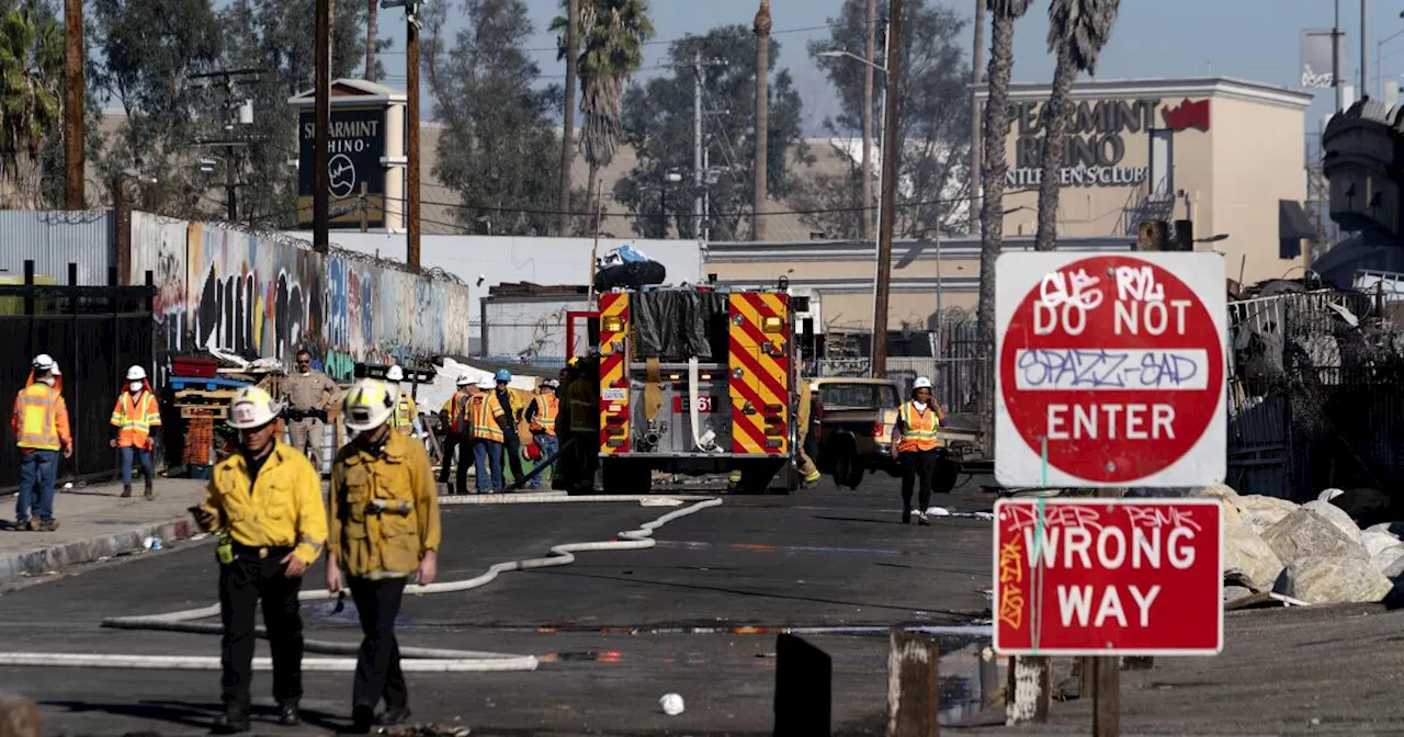 Los Angeles motorists urged to take public transport after massive fire closes interstate