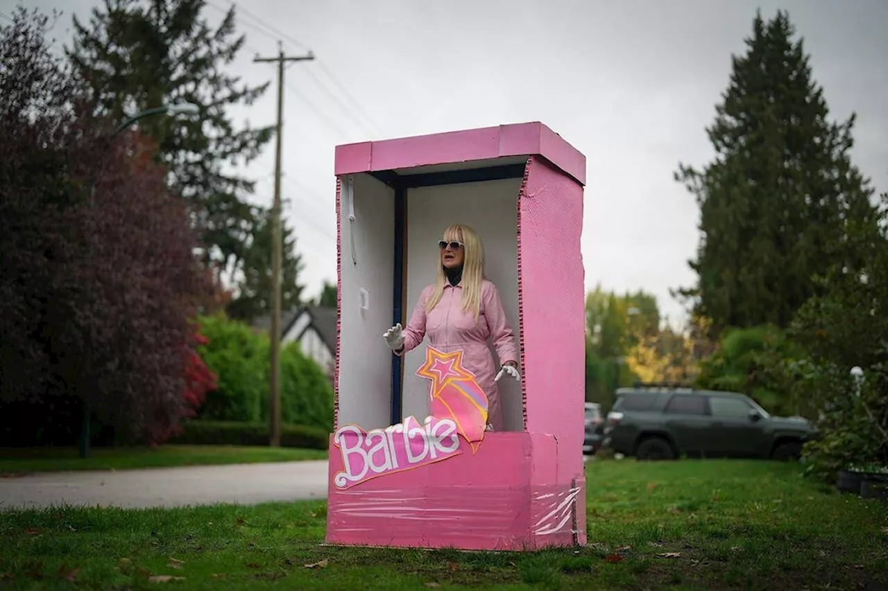 Woman dresses up in costumes to entertain passersby