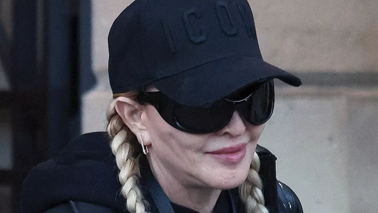 Madonna Emerges from Paris Ritz with Son David Banda