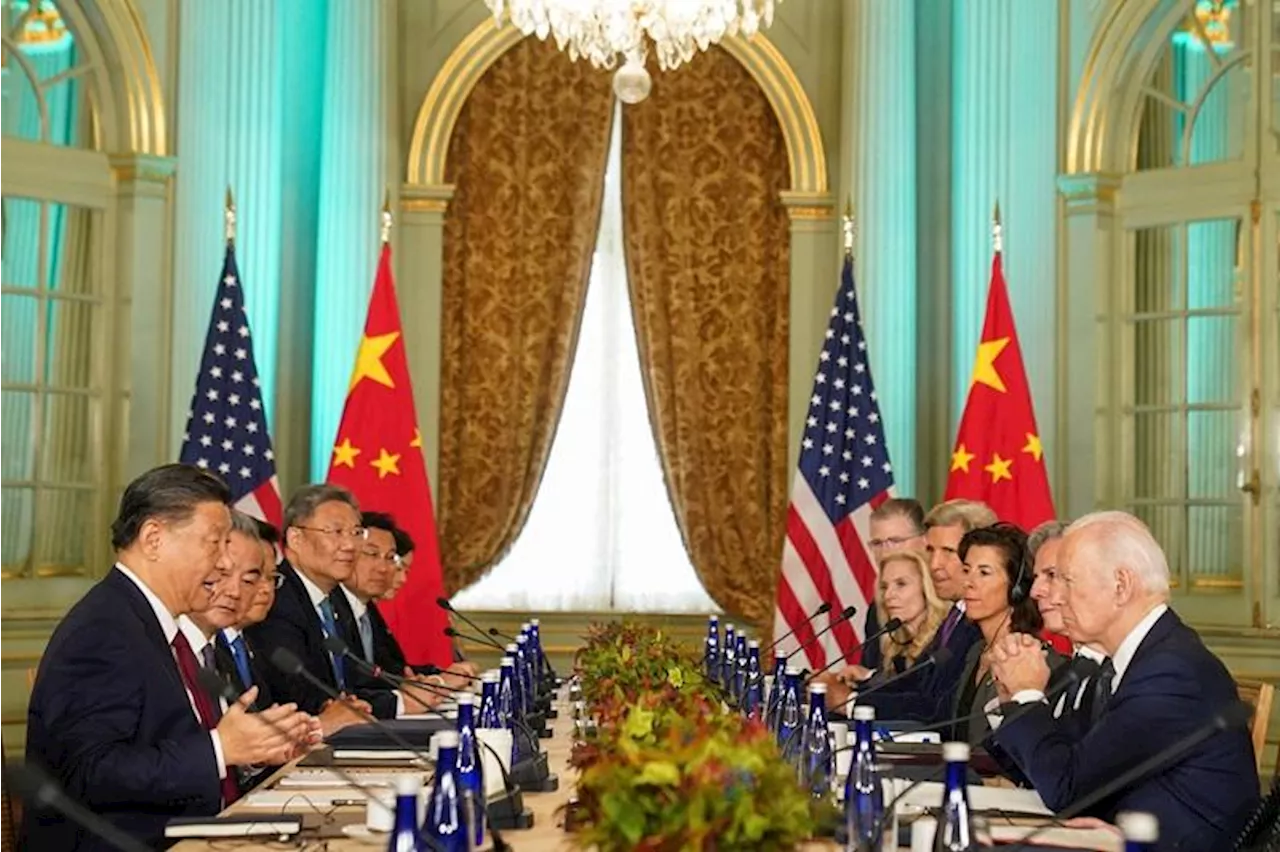 Biden and Xi Meet to Ease Friction Between U.S. and China