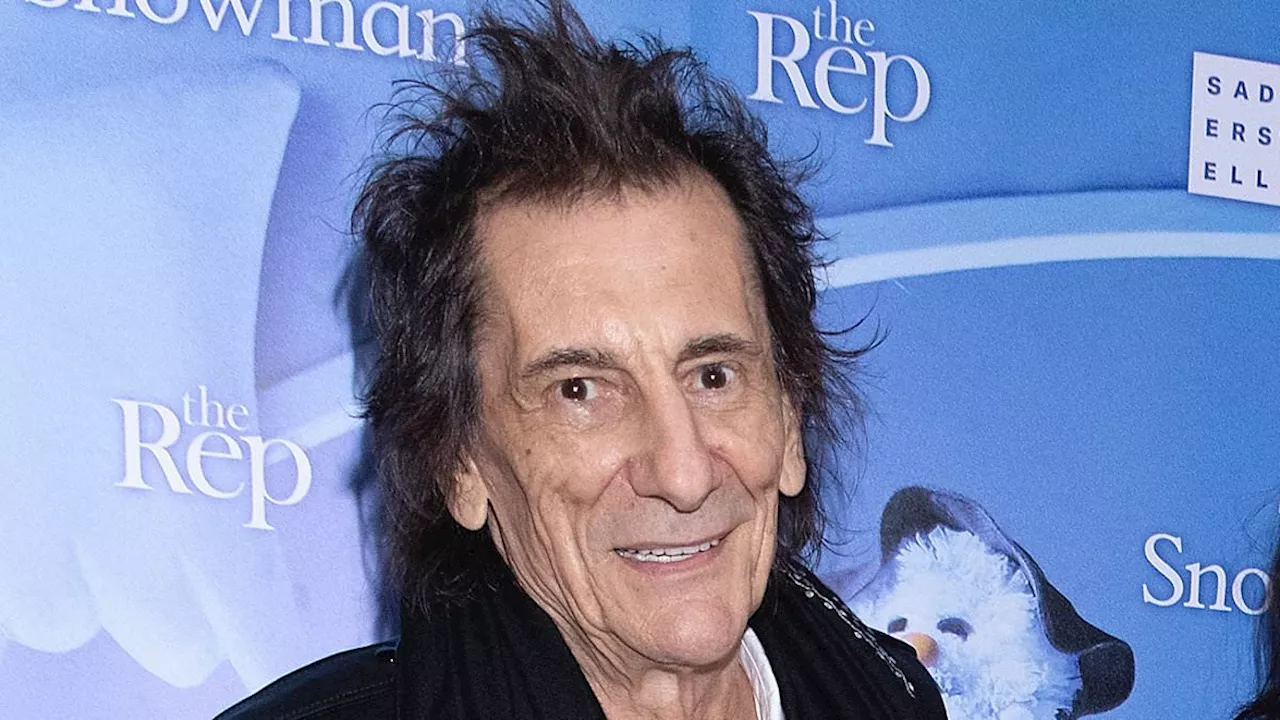 Ronnie Wood enjoys family day out with wife Sally and twin daughters