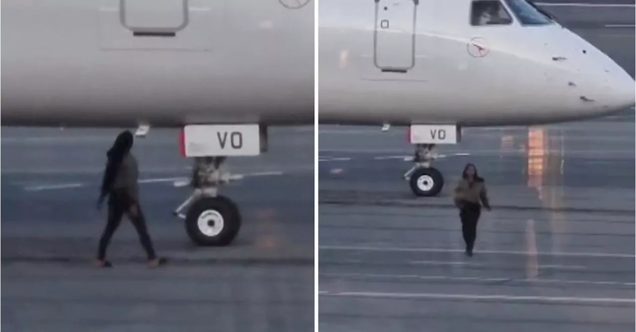 'Bizarre': Woman arrested after running onto tarmac at Canberra Airport