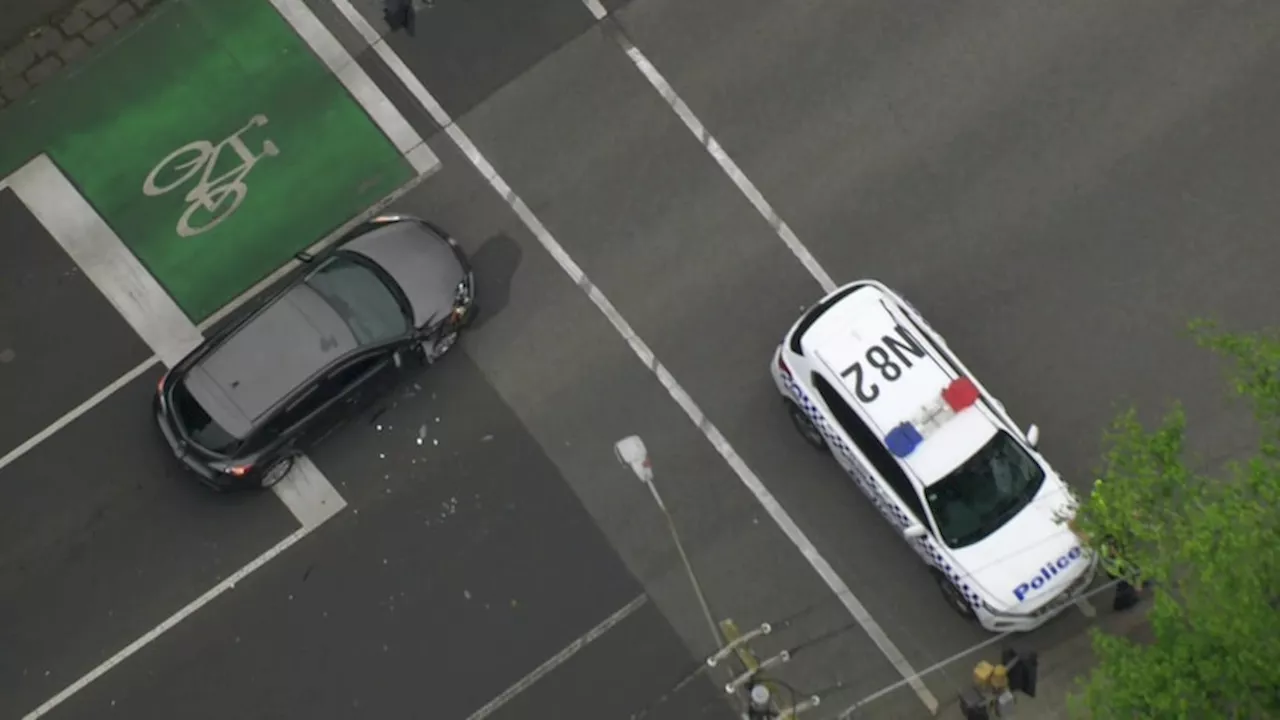 Man arrested after police chase goes through busy Melbourne park