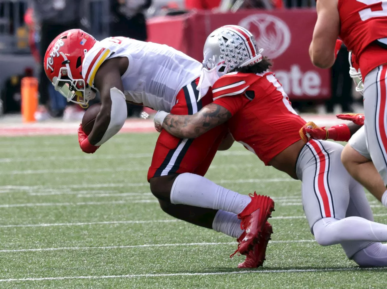 Which Ohio State football players previously out with injury are back at practice?