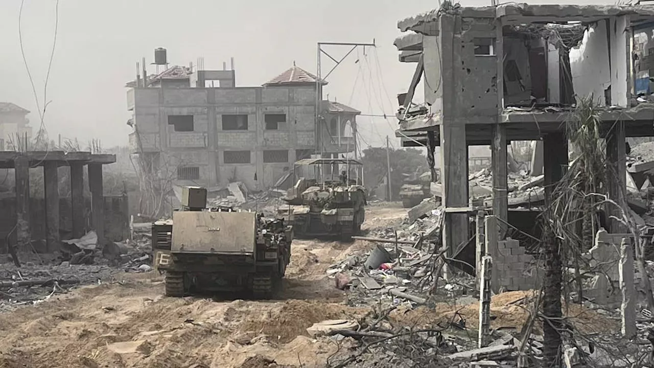 Efforts to pause fighting gain steam as Israeli troops push towards Gaza City