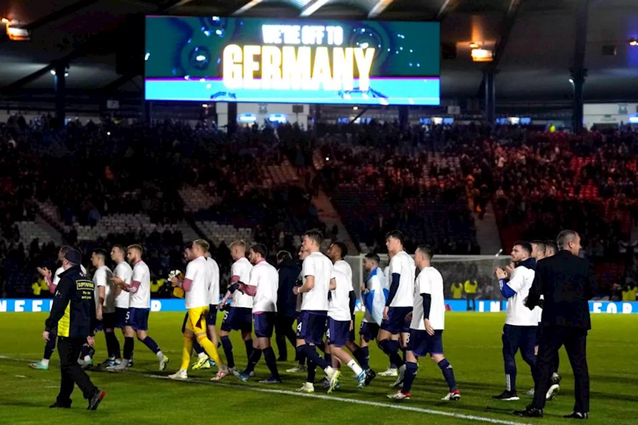 Scottish players celebrate Euro 2024 qualification