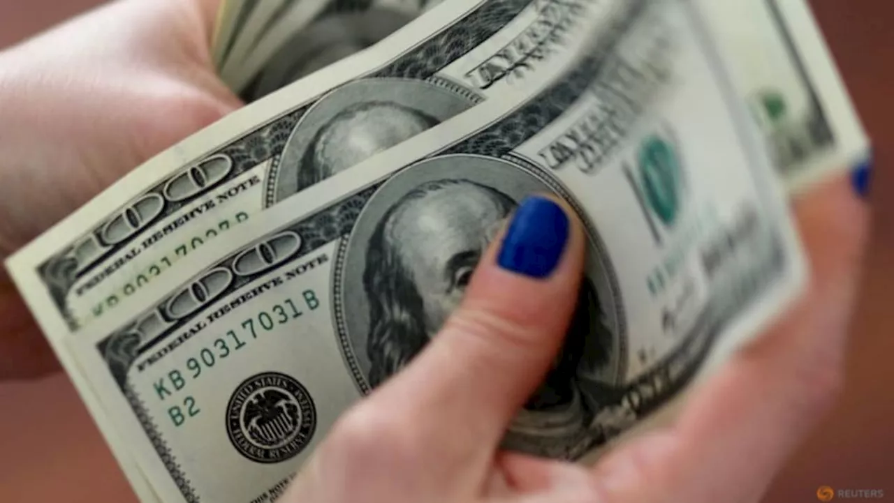 Dollar gains as data casts doubts over peak Fed rates