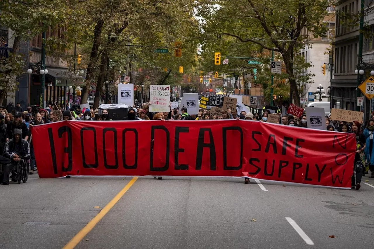 Safe supply supporters march after arrests of Vancouver drug activists