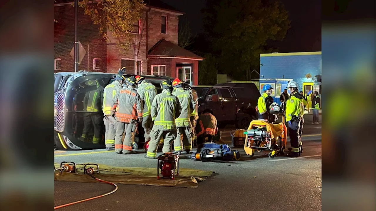 Man in hospital after SUV hits multiple parked vehicles, rolls over in Toronto