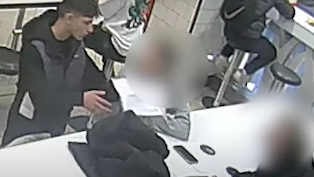 CCTV footage shows the moment phone thief uses a sheet of paper to distract his victim