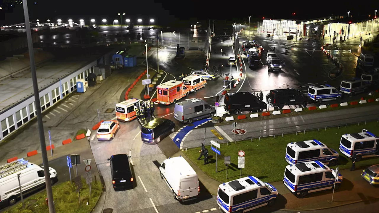 German airport closed after armed man breaches security with his car