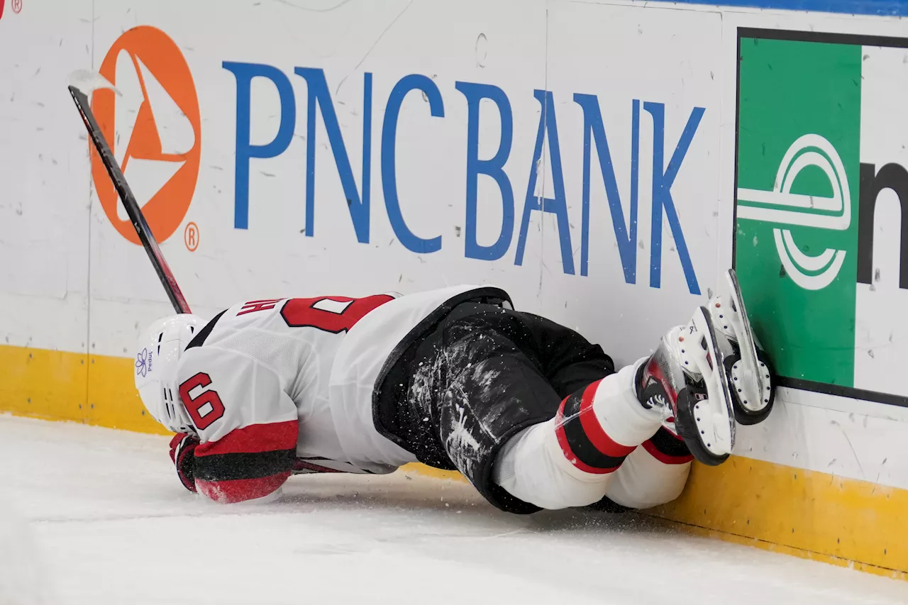 Jack Hughes crashes into boards, suffers scary injury in Devils win