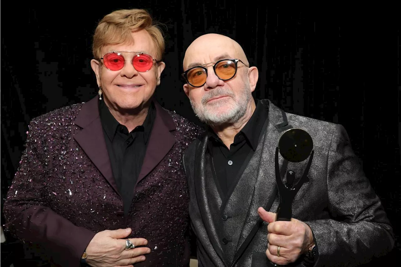 Elton John Inducts Bernie Taupin into Rock Hall, Plays 'Tiny Dancer'