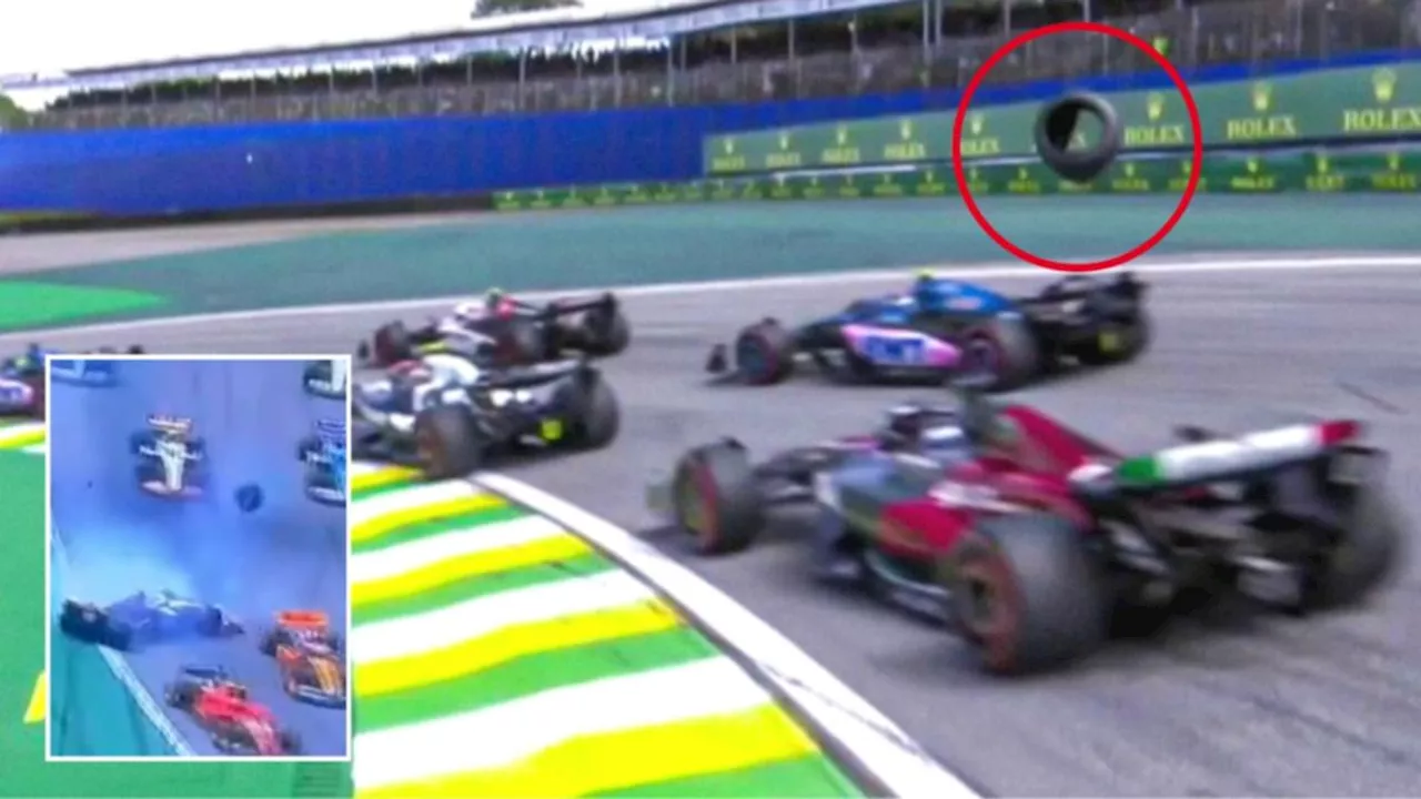 Daniel Ricciardo hit by flying tyre during chaotic start to Formula One Brazilian Grand Prix