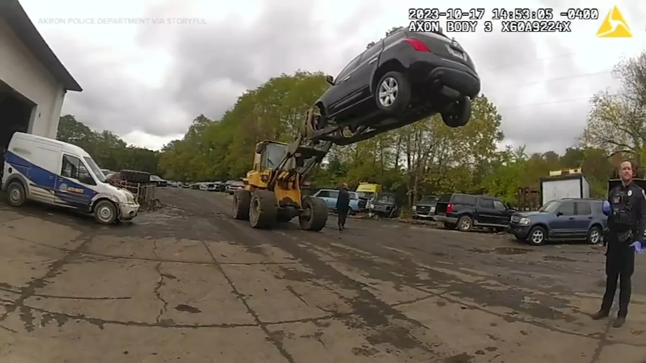 Auto shop employees use forklift to stop car theft, police body cam video shows