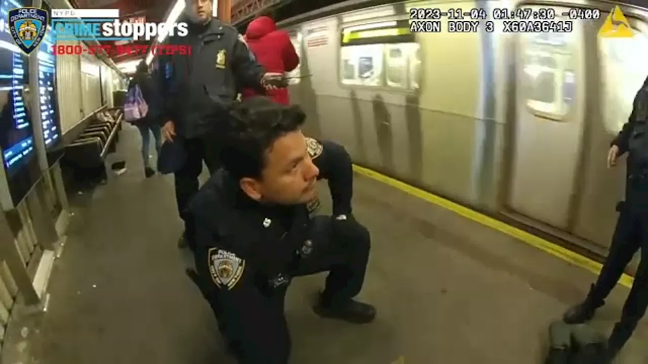 NYPD officers rescue man who fell on subway tracks in Queens with train approaching