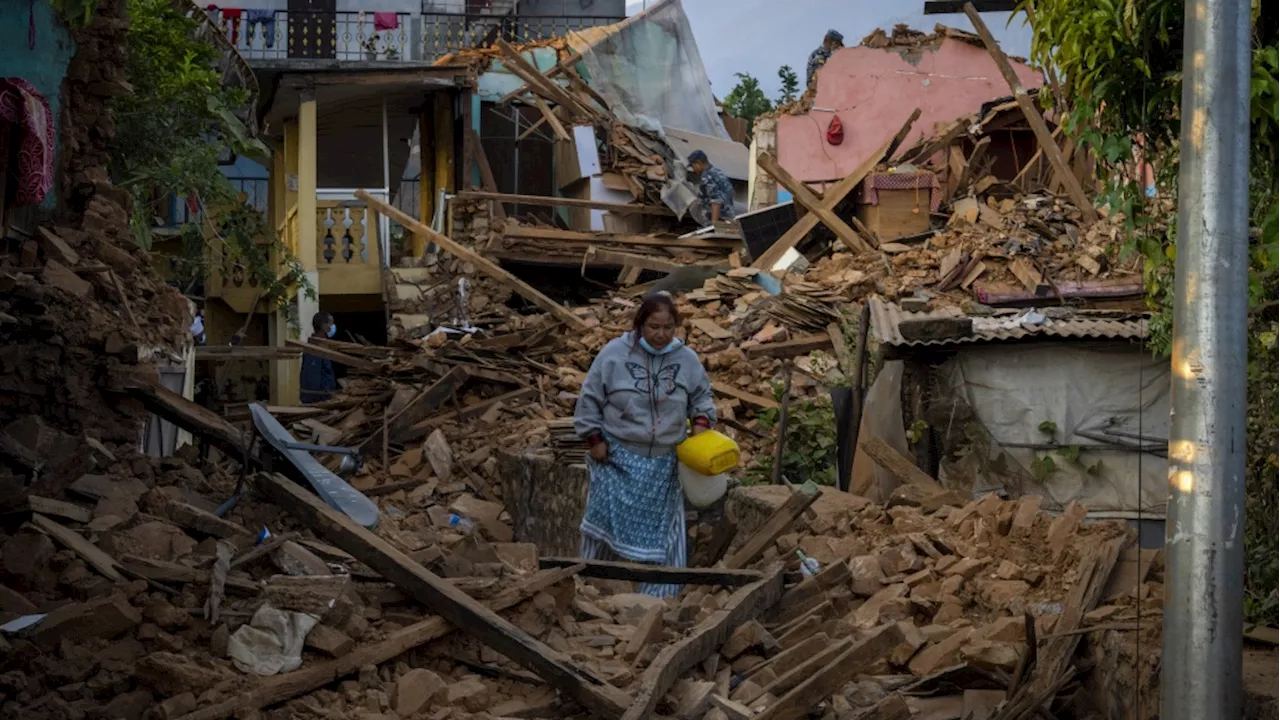 Nepal villagers cremate loved ones who perished in earthquake that shook its northwest, killing 157