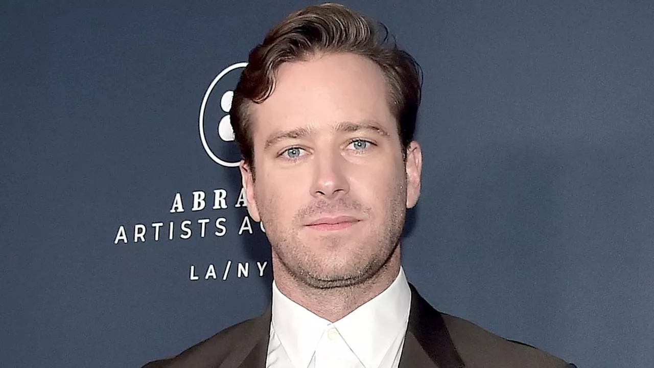 Armie Hammer jokes about overcoming 'land mines' in recent years following allegations of...