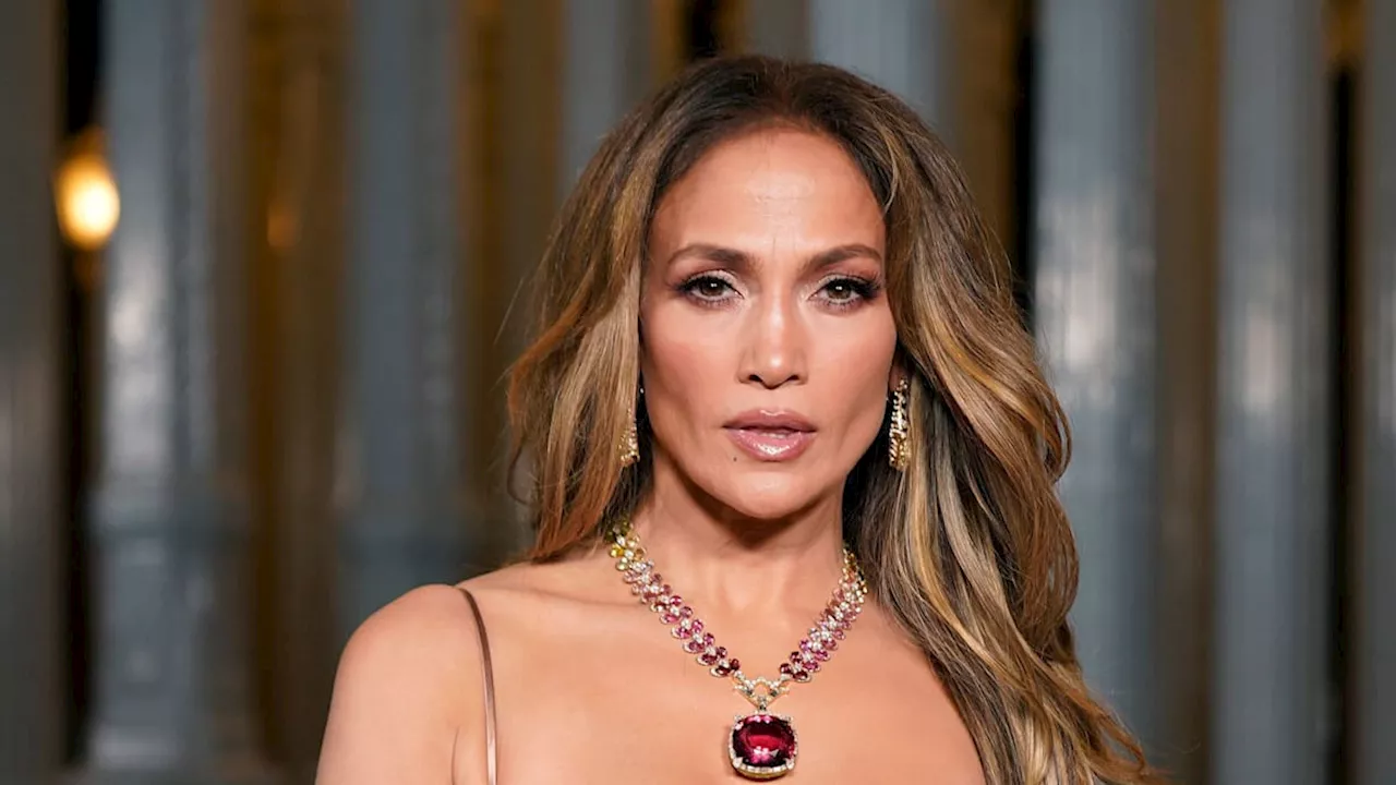 Jennifer Lopez is bronzed and beautiful in a sheer dress for date night with Ben Affleck