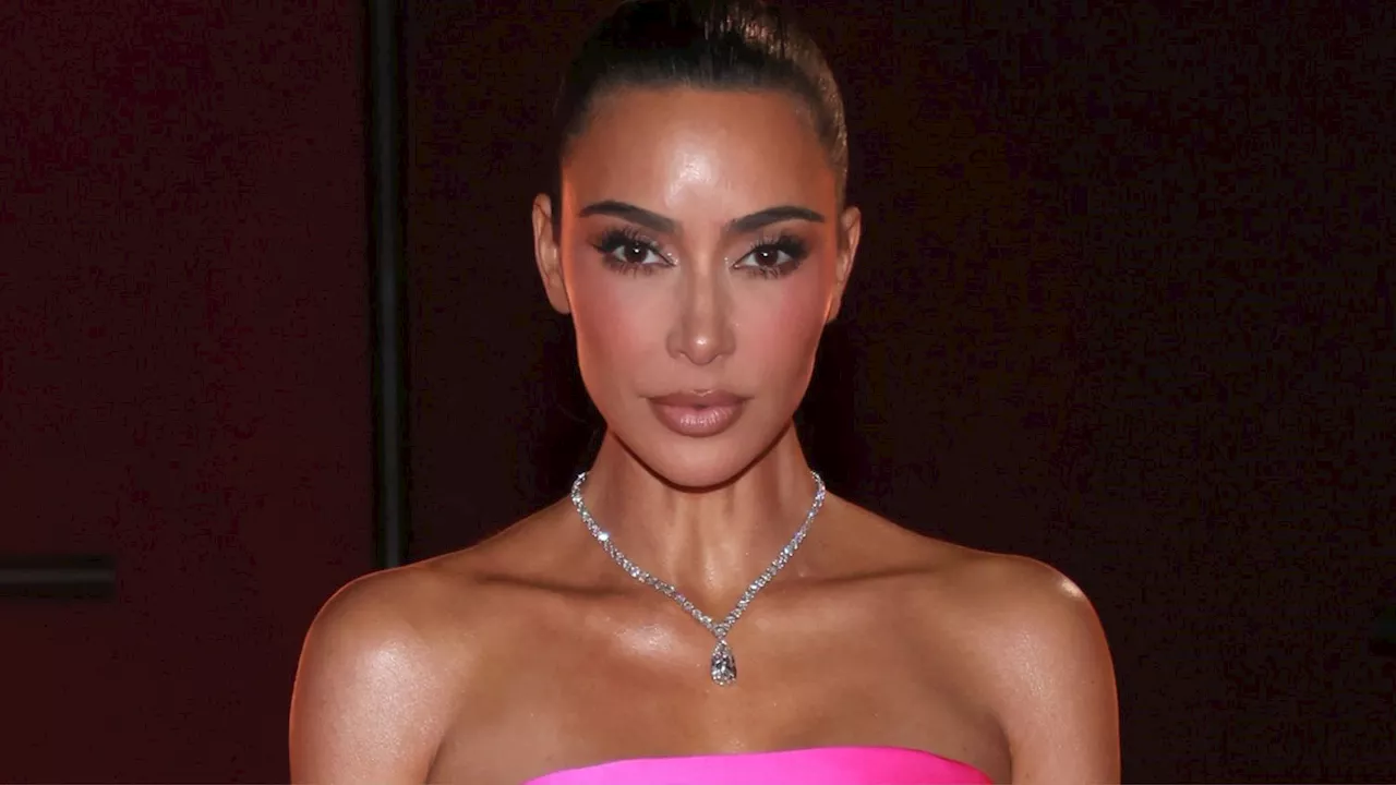 Kim Kardashian Puts an Edgy Spin on Barbiecore With a Hot Pink Gown and Black Opera Gloves