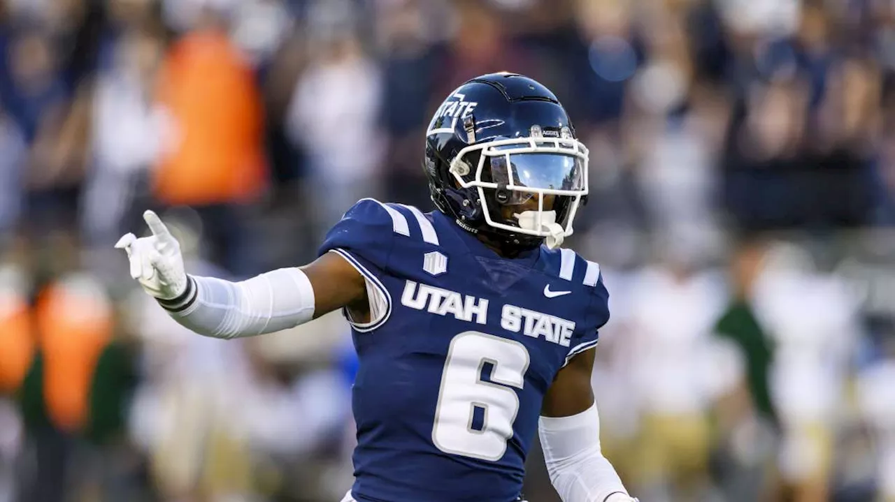 Utah State keeps bowl hopes alive, beats San Diego State 32-24 in 2 OT