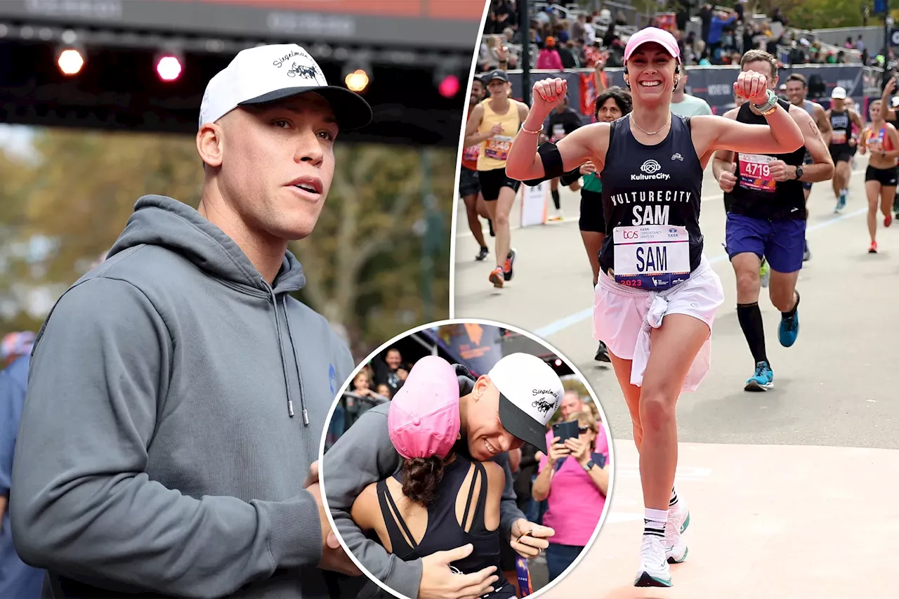 Aaron Judge hugs wife Samantha Bracksieck after she finishes NYC marathon