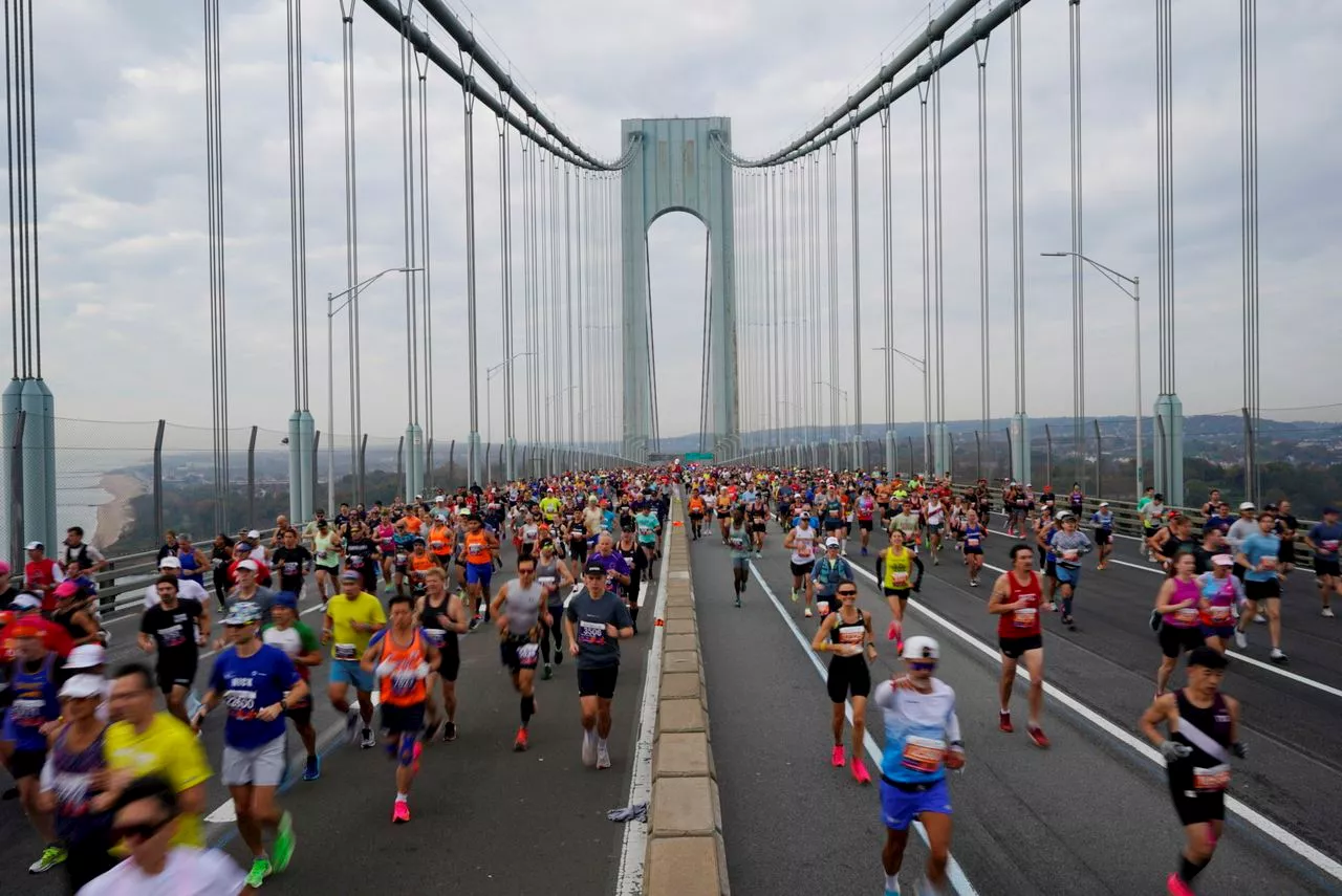 Tamirat Tola sets course record to win NYC Marathon; Hellen Obiri takes women’s title