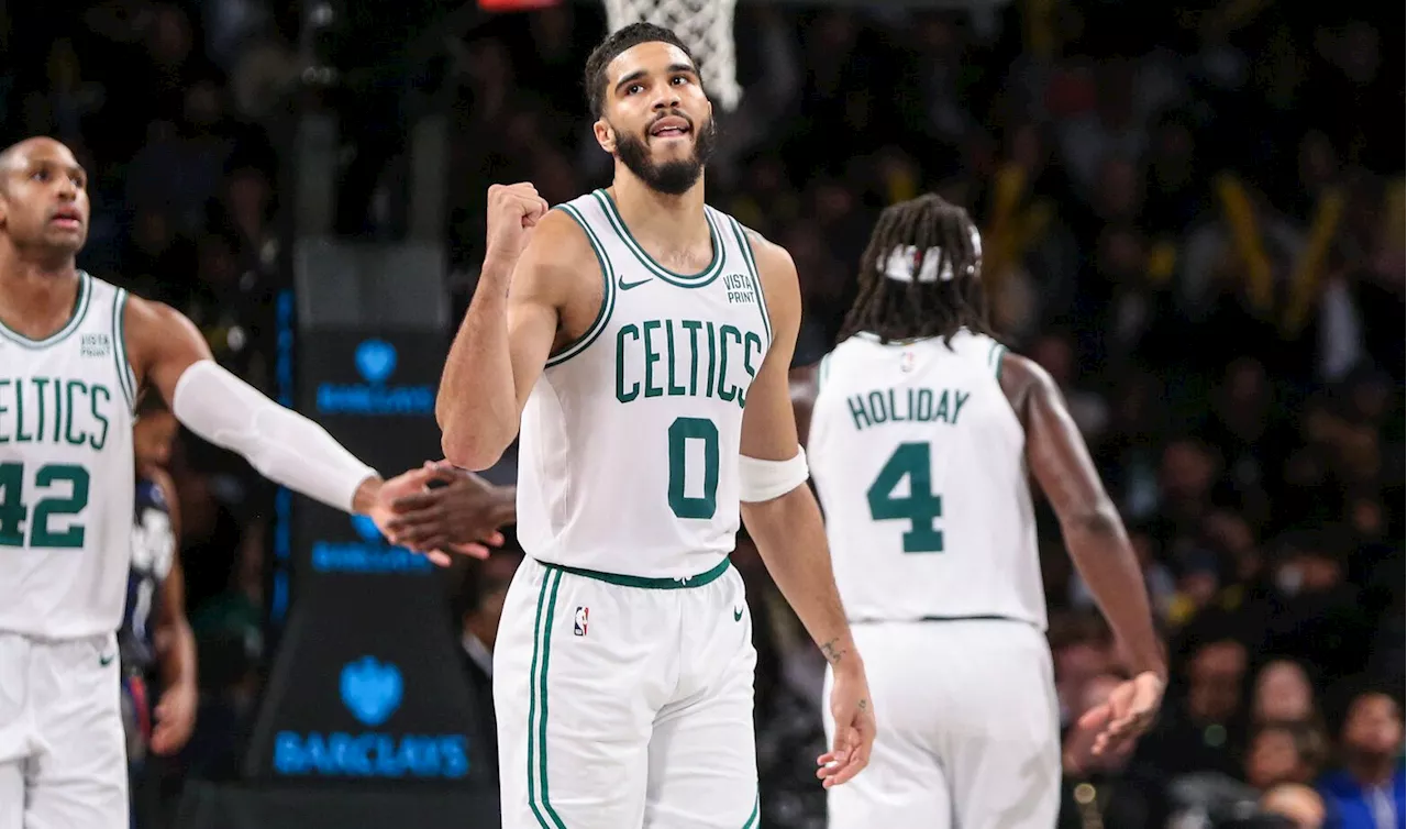 Tatum sets franchise mark as Celtics bury Nets