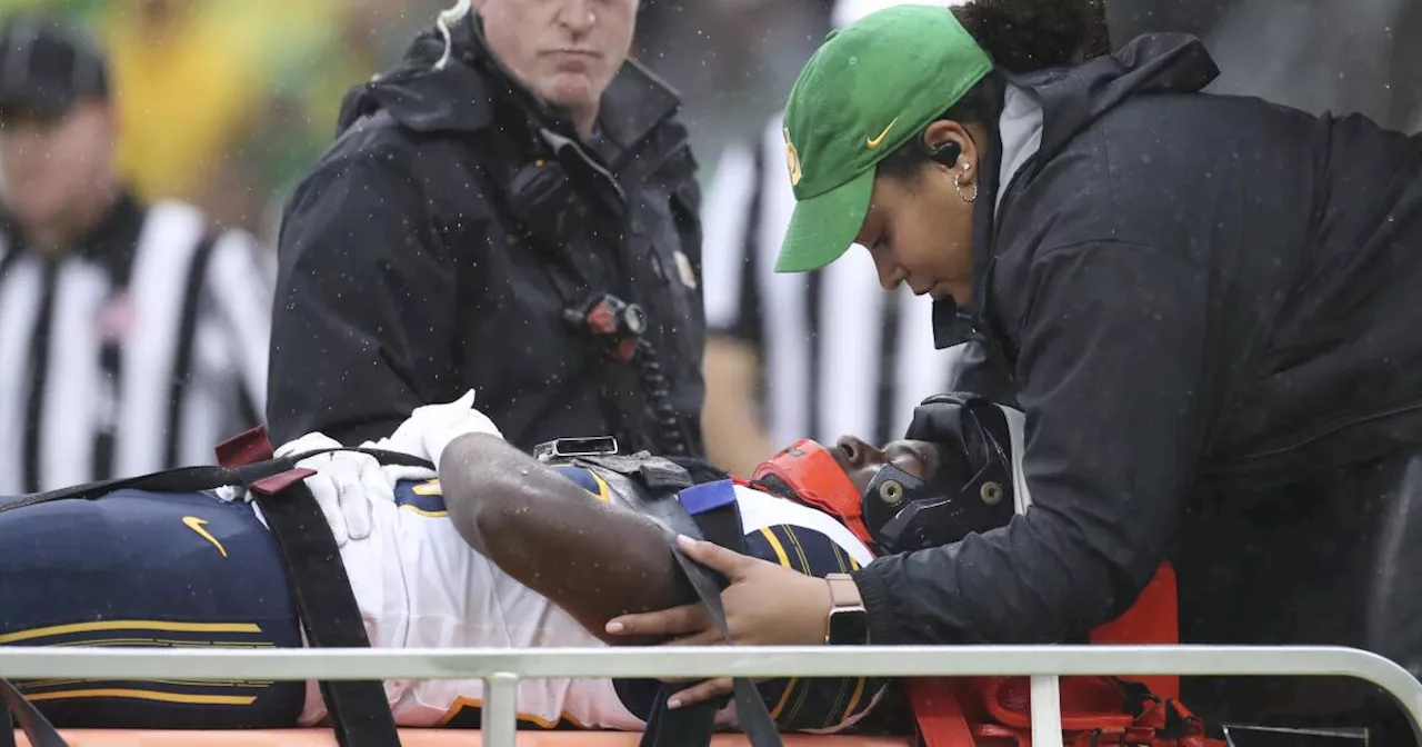 Cal freshman Jaivian Thomas carted off the field after injury at Autzen Stadium